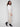 Experience the convenience of side zip pockets in these slim-leg greige techno pants by Charlie B.