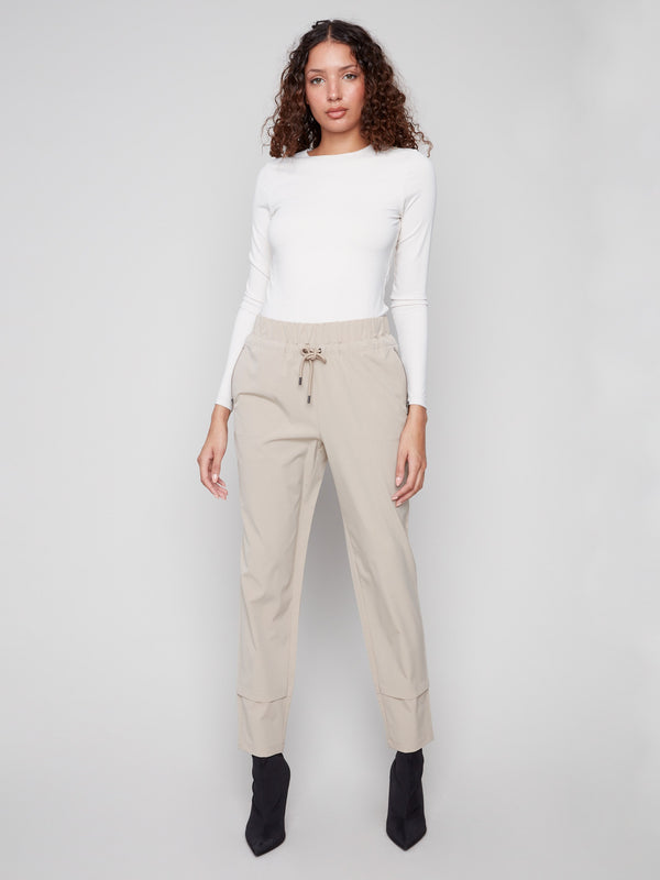 Greige pants with cuff detail add a touch of sophistication to your wardrobe essentials by Charlie B.