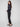 Cuff detail enhances the sleek design of these versatile black techno pants, ideal for any occasion by Charlie B.