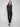 Black slim-leg techno pants with adjustable waistband, side pockets, and drawcords by Charlie B.