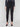 Black slim-leg techno pants with adjustable waistband, side pockets, and drawcords by Charlie B.