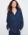 Indigo Tencel shirt with a relaxed fit, featuring button-front closure and a chest patch pocket by Charlie B.