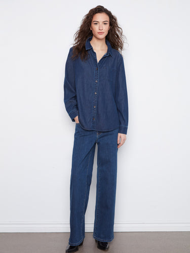 Crafted from indigo Tencel, this shirt offers long sleeves and a classic shirt collar by Charlie B.