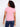 Elegant pink top with semi-fitted cut, ideal for layering or wearing alone. By Charlie B.