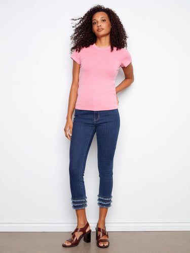 Versatile pink t-shirt designed with a ribbed finish and classic crew neck style. By Charlie B.