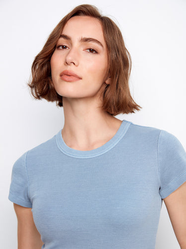 The soft fabric of this crew neck top ensures all-day comfort while maintaining style. By Charlie B.