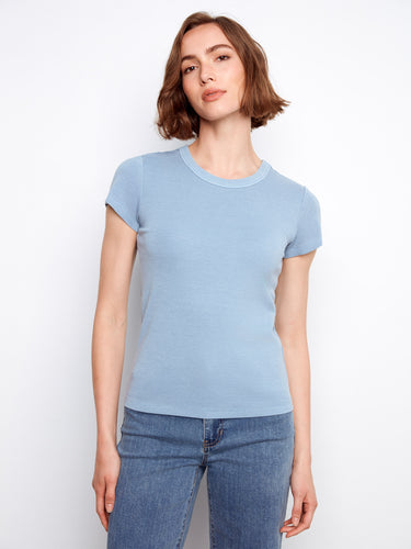 A versatile piece, this ribbed texture top pairs well with jeans or skirts for various occasions. By Charlie B.