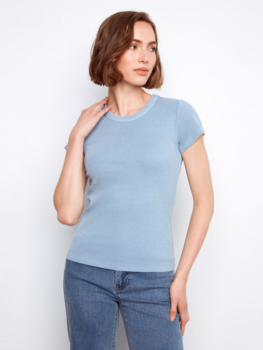 Designed with simplicity in mind, the semi-fitted cut provides an elegant silhouette. By Charlie B.