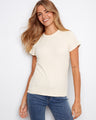 This top features a classic crew neck design, offering a timeless and versatile look for any occasion. By Charlie B.
