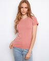 Ribbed texture enhances the semi-fitted style of this carnation T-shirt, offering a trendy and versatile look by Charlie B.