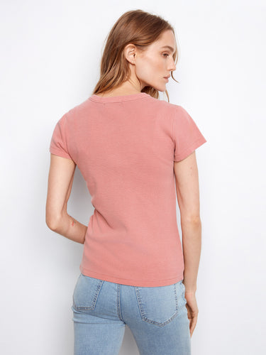 Embrace simplicity with this semi-fitted carnation tee, showcasing a classic crew neck and ribbed texture by Charlie B.