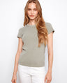 This top features a classic crew neck design, perfect for any casual outing. The simplicity adds elegance to your style by Charlie B.