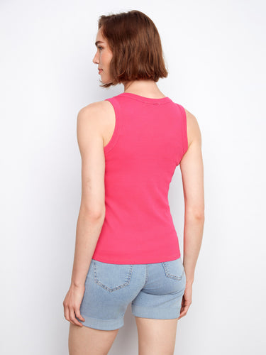 Comfortable pink tank top, ideal for layering or wearing alone on warm days. By Charlie B.