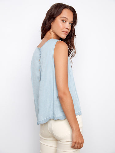 Enjoy the freedom of movement with the sleeveless design of this fashionable and comfortable top by Charlie B.