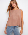 This top features a loose fit, offering comfort and style for any occasion. Perfect for pairing with jeans or skirts. By Charlie B.