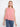 Stylish pink top showcasing decorative back buttons for added flair, making it both trendy and versatile by Charlie B.