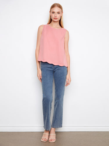 This fashionable pink top features a unique scallop hem that enhances its modern appeal, designed thoughtfully by Charlie B.