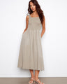 Elegant dress featuring a maxi length with a flowing silhouette, perfect for any occasion. By Charlie B.