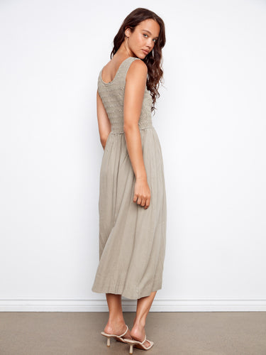 Stylish dress showcasing side pockets for added convenience and style. By Charlie B.