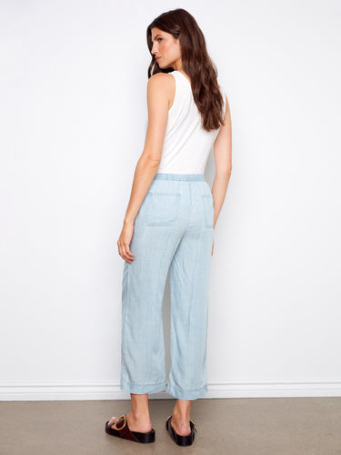 Featuring a cropped length and wide-leg design, these Tencel jogger pants in light blue are both stylish and comfortable by Charlie B.