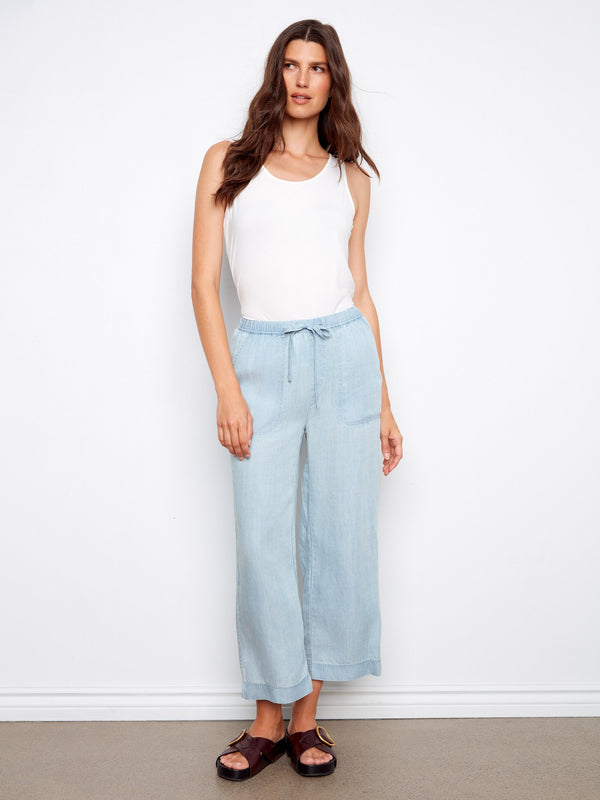 Enjoy the practicality of slash pockets on these light blue wide-leg joggers made from soft Tencel fabric by Charlie B.