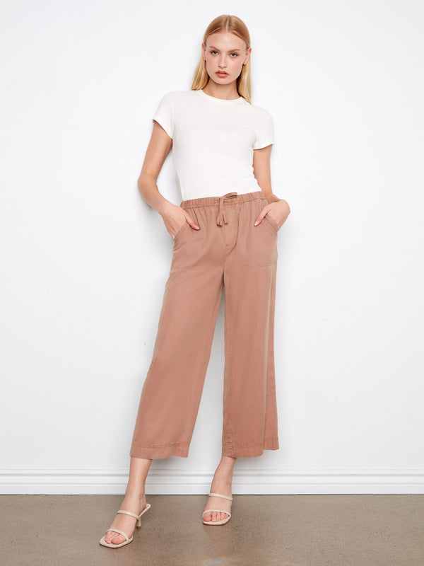 These pants feature a wide leg design, offering a relaxed and stylish fit for any occasion. By Charlie B.