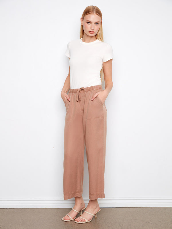 Designed with an elastic waistband, these pants ensure comfort and flexibility throughout the day. By Charlie B.