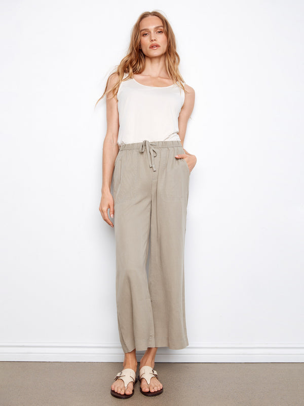 These pants feature a wide leg design, offering a relaxed fit for everyday comfort. By Charlie B.