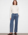 Medium blue pants crafted from Tencel fabric, offering a soft and comfortable feel by Charlie B.