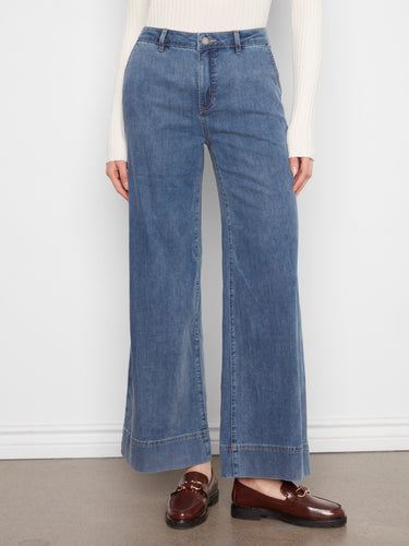 These full-length wide-leg pants in medium blue provide an elegant silhouette by Charlie B.