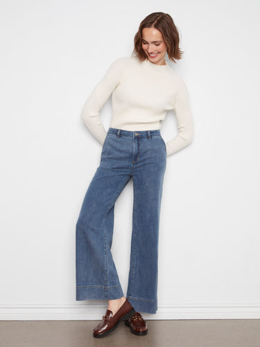 Experience comfort with the slash pockets on these stylish medium blue wide-leg pants by Charlie B.