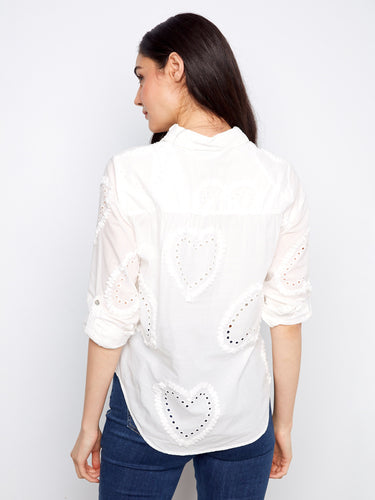 Designed with adjustable roll-up sleeves, this shirt provides both comfort and adaptability for any occasion by Charlie B.