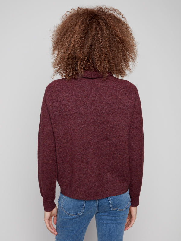 Enjoy the seamless design of this Cabernet knit sweater with its chic cowl neck by Charlie B.