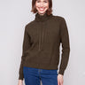 Spruce knit sweater featuring a cozy cowl neck with drawstring detail, perfect for layering by Charlie B.