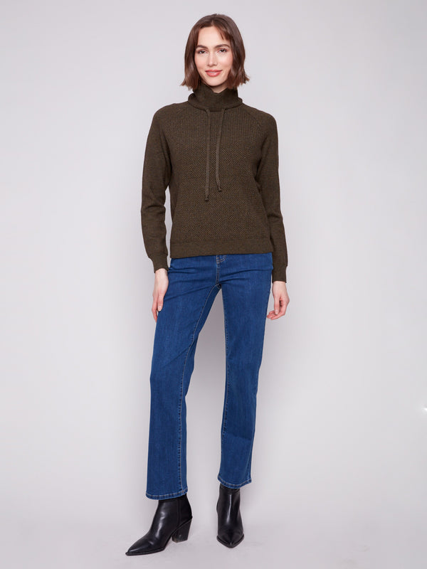 Elegant textured front on this heather spruce sweater adds depth and style to your wardrobe by Charlie B.