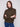Heathered texture and raglan sleeves create a timeless look in this stylish knit sweater by Charlie B.