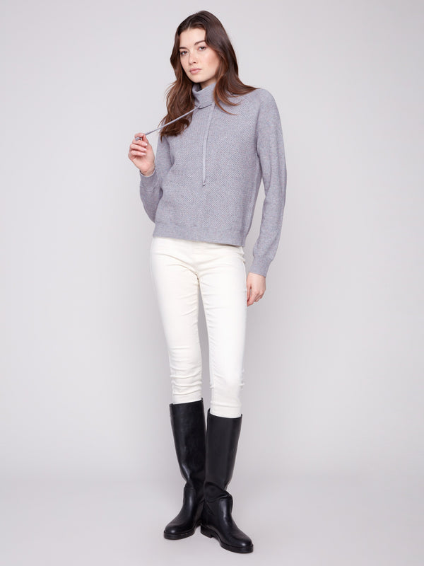 Elegant heather grey sweater with textured front, perfect for a chic and cozy look by Charlie B.