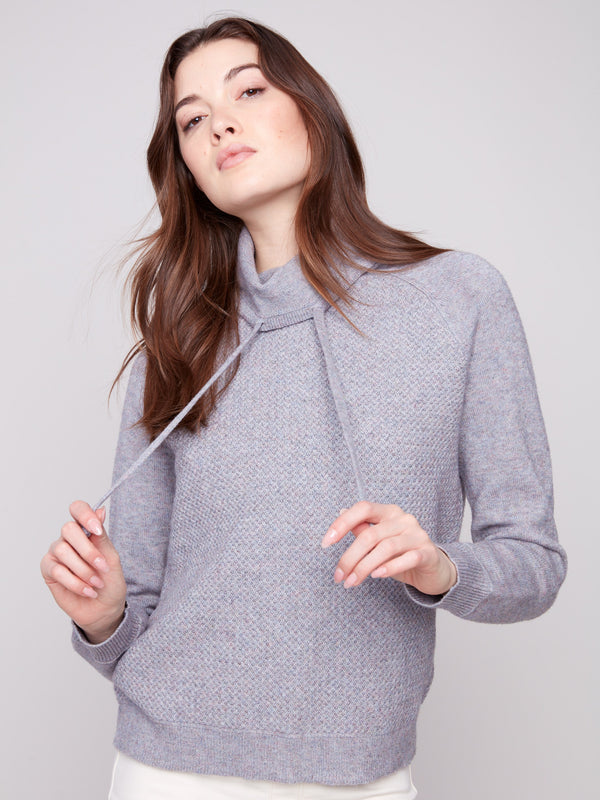 Raglan sleeves enhance the comfort and style of this heather grey knit sweater by Charlie B.