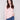 Ballet pink sweater with a mock neck and slim fit, paired perfectly with blue jeans for a chic look by Charlie B.