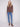 Mocha long-sleeve sweater featuring a slim fit, matched with blue jeans for an elegant outfit by Charlie B.