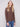Stylish mocha sweater with a mock neck and blue jeans ensemble for a refined appearance by Charlie B.