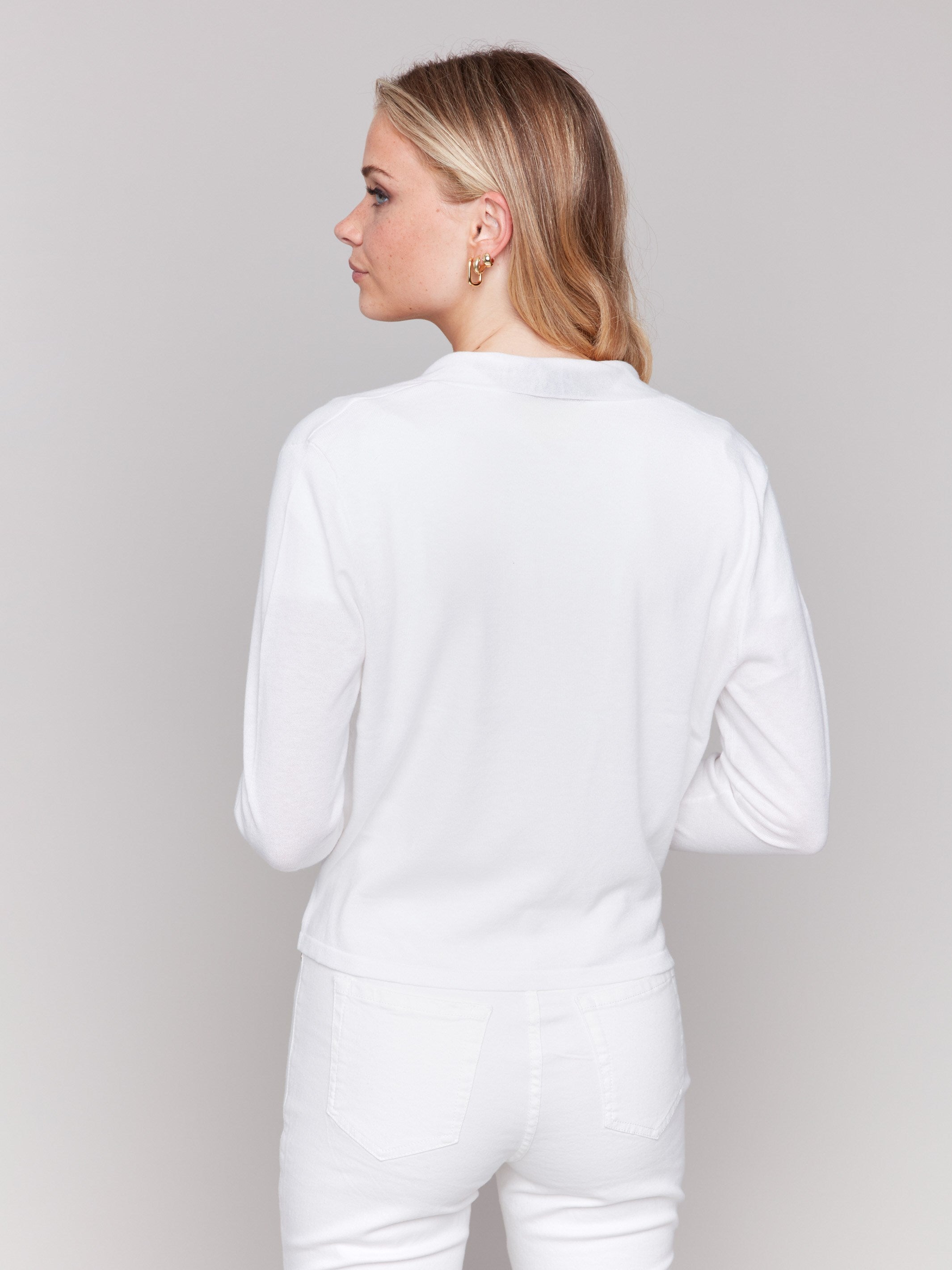 Long sleeve bolero in white hue by Charlie B.