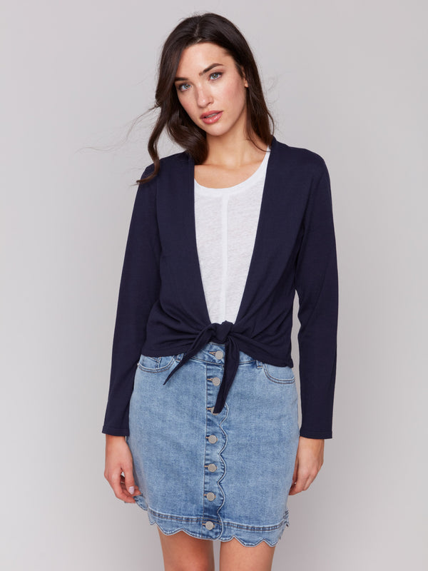 Navy bolero featuring a shawl neckline by Charlie B.