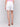 White twill shorts designed with a regular rise by Charlie B.