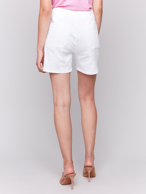 White twill shorts designed with a regular rise by Charlie B.