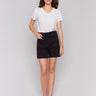 Black shorts with stretch twill fabric and belt loops by Charlie B.