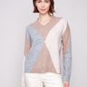 Heather Sesame argyle sweater showcasing the elegant V-neck design, perfect for a chic and cozy look by Charlie B.