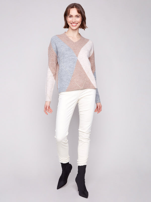 Stylish Heather Sesame sweater with jacquard pattern, offering a blend of comfort and elegance by Charlie B.