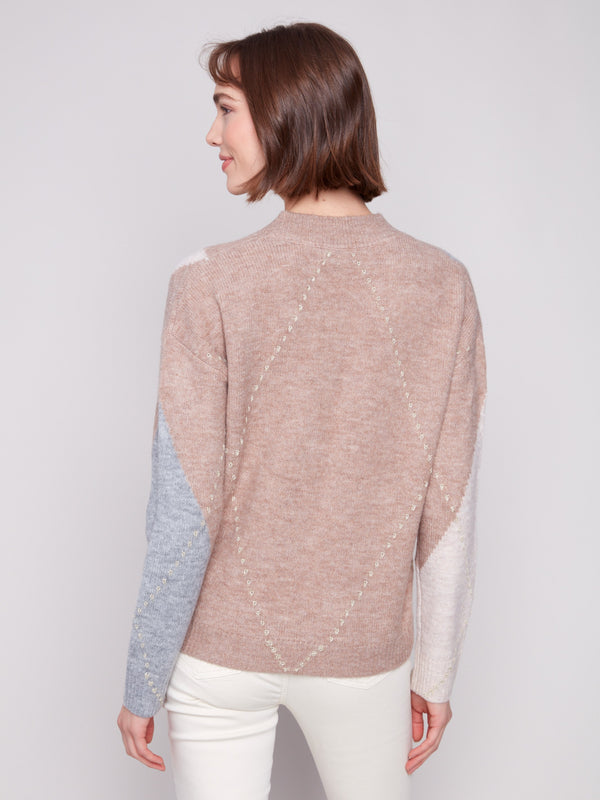 Chic Heather Sesame argyle sweater with long sleeves, ideal for layering in cooler weather by Charlie B.