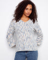 Soft mist-colored sweater with a V-neck, showcasing 3/4 sleeves for a relaxed fit by Charlie B.